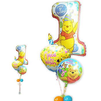 プーさんのバルーンが1才誕生日ケーキでお祝い - 1歳誕生日プーファースト&ウィッシュイエローカップケーキ3バルーンセット<補充用ヘリウムガス付・本州送料無料>